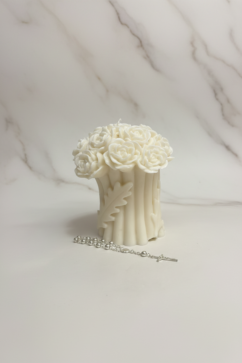 Rose Bouquet Sculptural Candle with rosary on white marble
