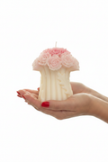 Hands with Red Nails Holding Candle