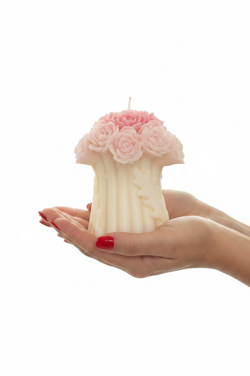Hands with Red Nails Holding Candle