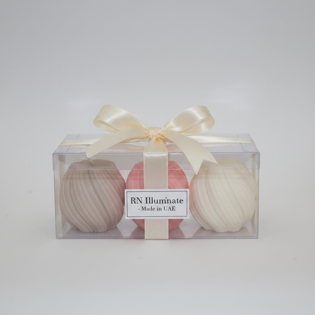 Twisted sphere soy candle in clear gift box with satin ribbon and RN Illuminate label