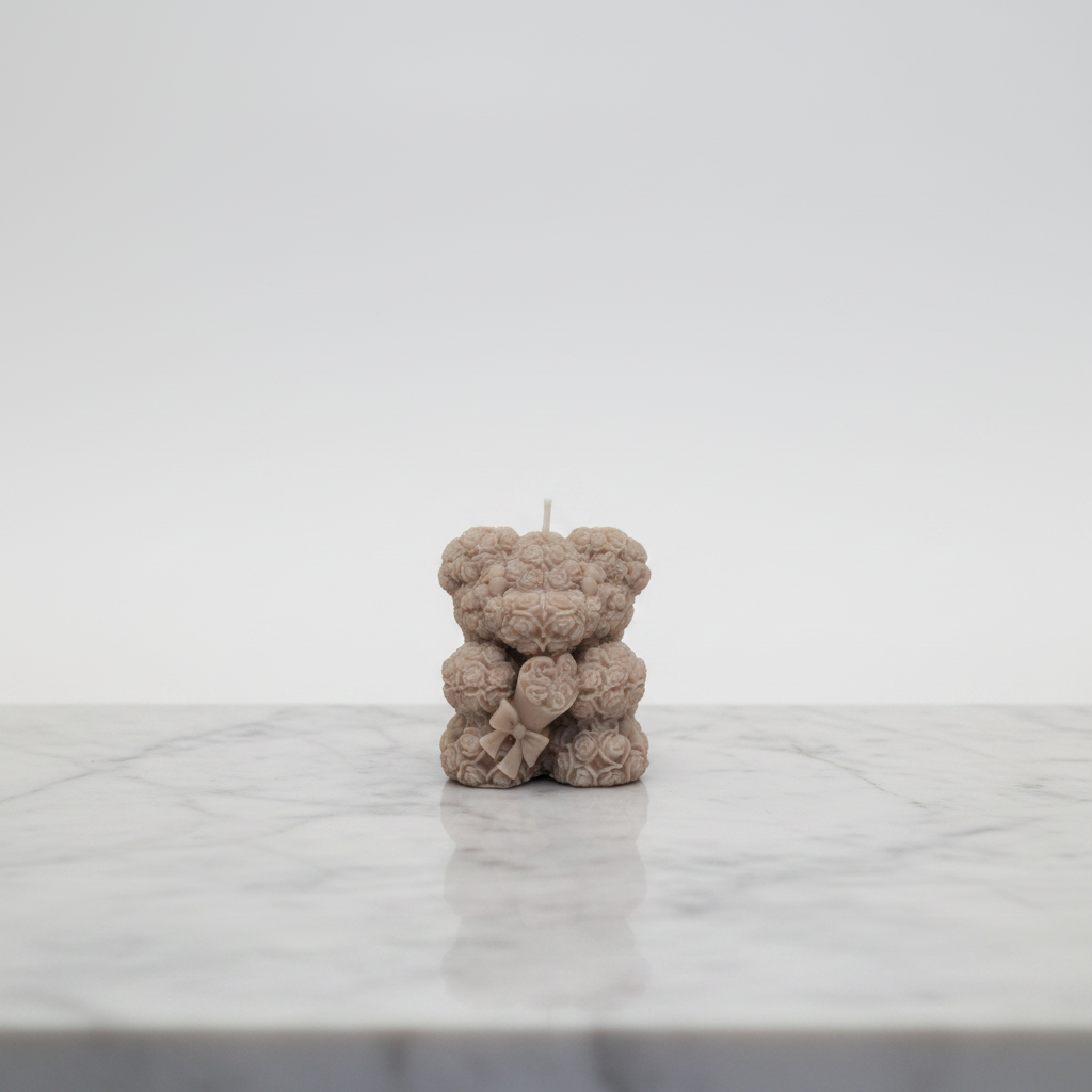 Rose teddy bear soy candle on grey tabletop by RN Illuminate UAE